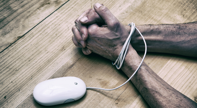 computer mouse ties to workers hands